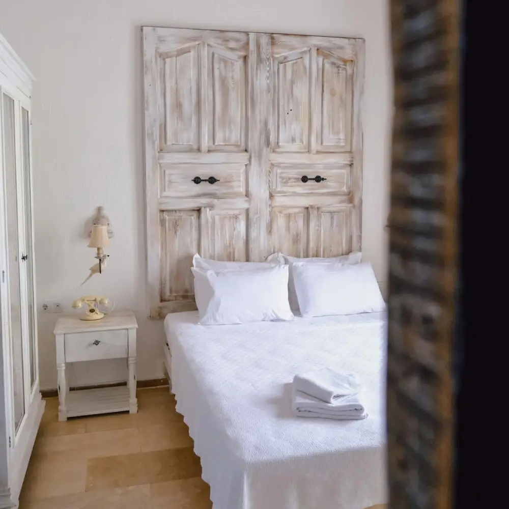 white bed in bedroom image